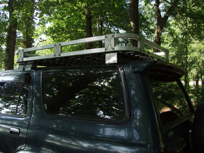 Riveting a roof rack onto Surf with sunroof. Hilux Surf